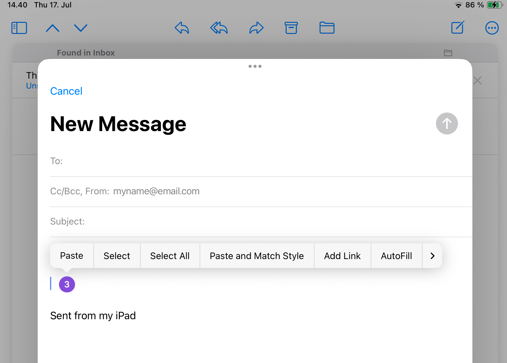 カーソル位置に「ペースト」と「選択」のオプションが表示された、iOSのテキスト編集ポップオーバー付きiPad Mailの新規メッセージ